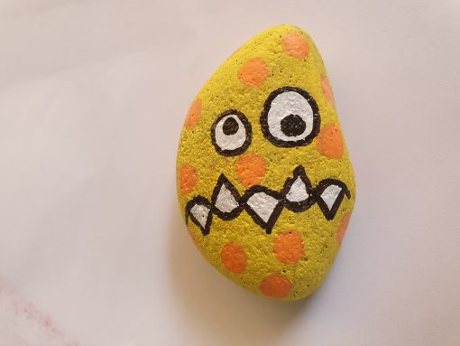 Geel met oranje gestippeld monstertje
