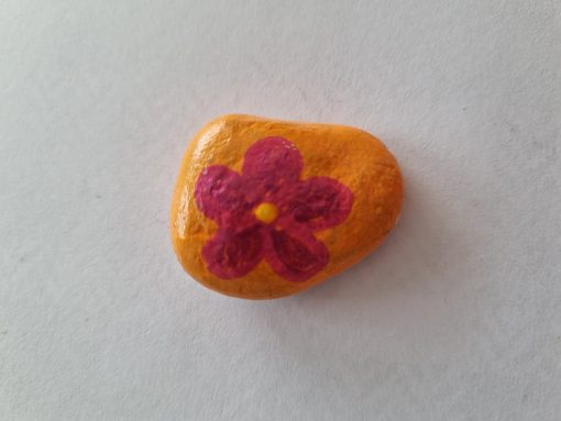 Roze bloem op orange