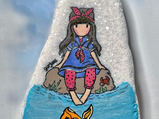Meisje met voetjes in water