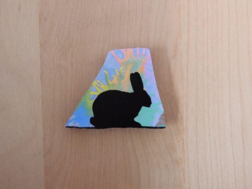 Silhouet konijn op gekleurde achtergrond